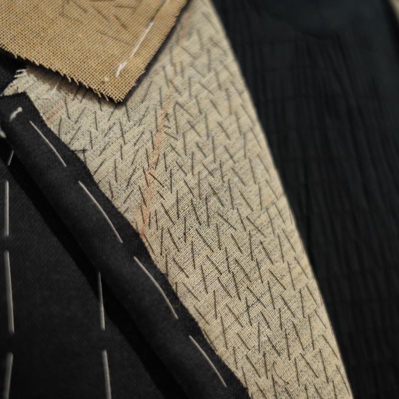 Pad stitching on a canvas lapel